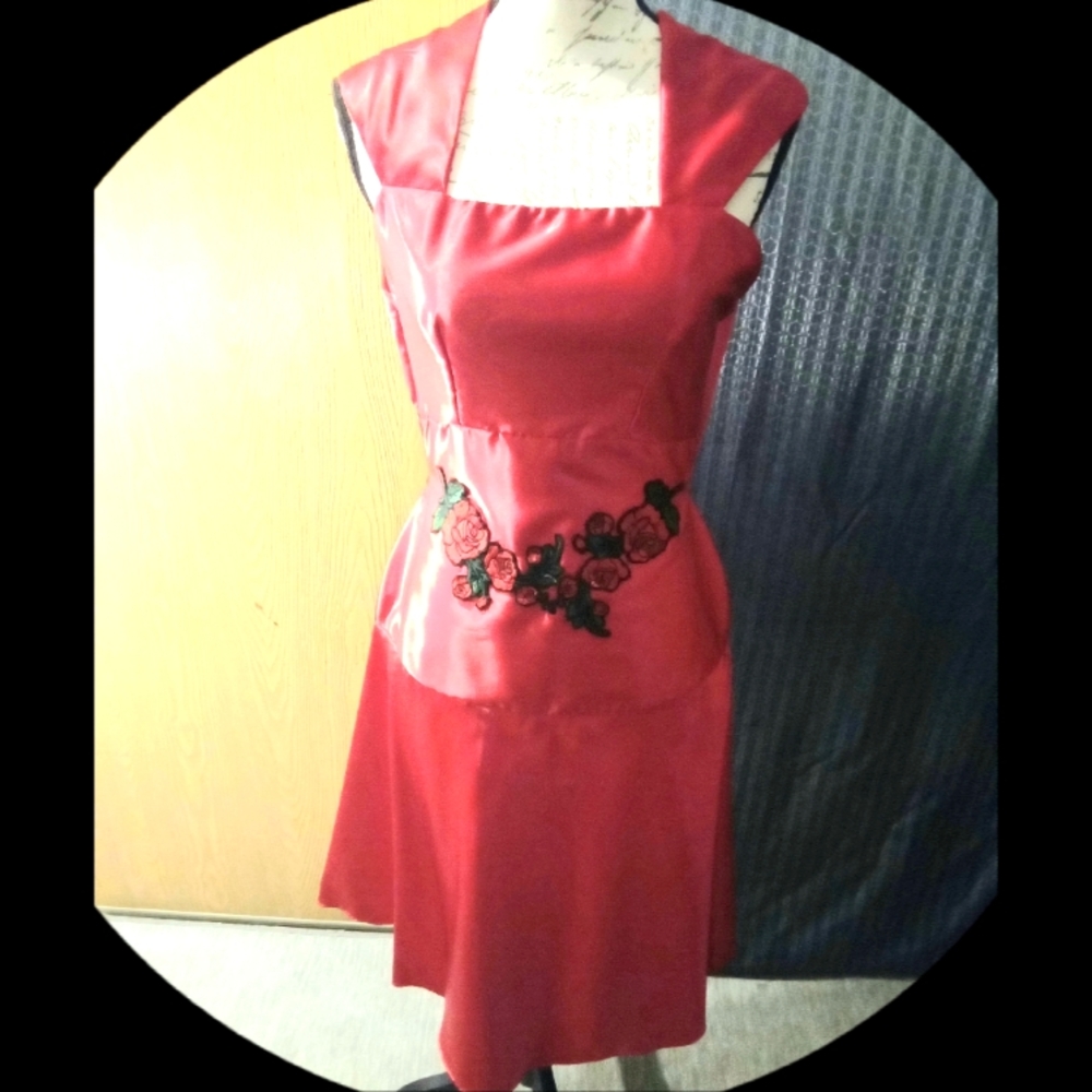 Red stunning satin sleeveless dress, small in size, An ideal choice for parties.